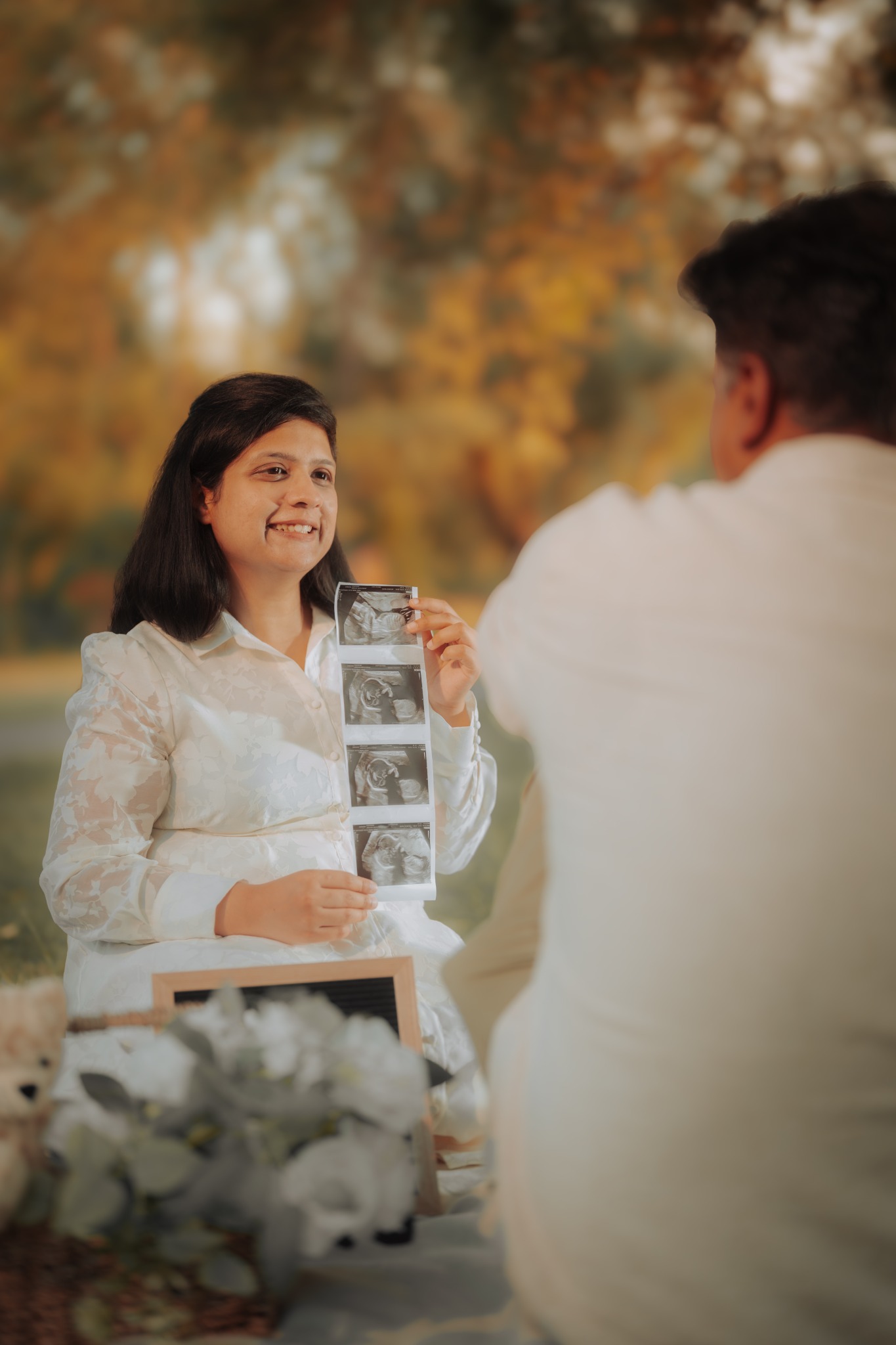 Maternity story with parents and ultrasound images